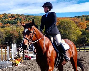 Image of Annika Ryer, member of the equestrian team.